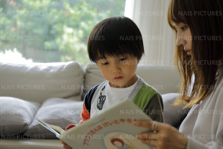 mother and her son reading a book